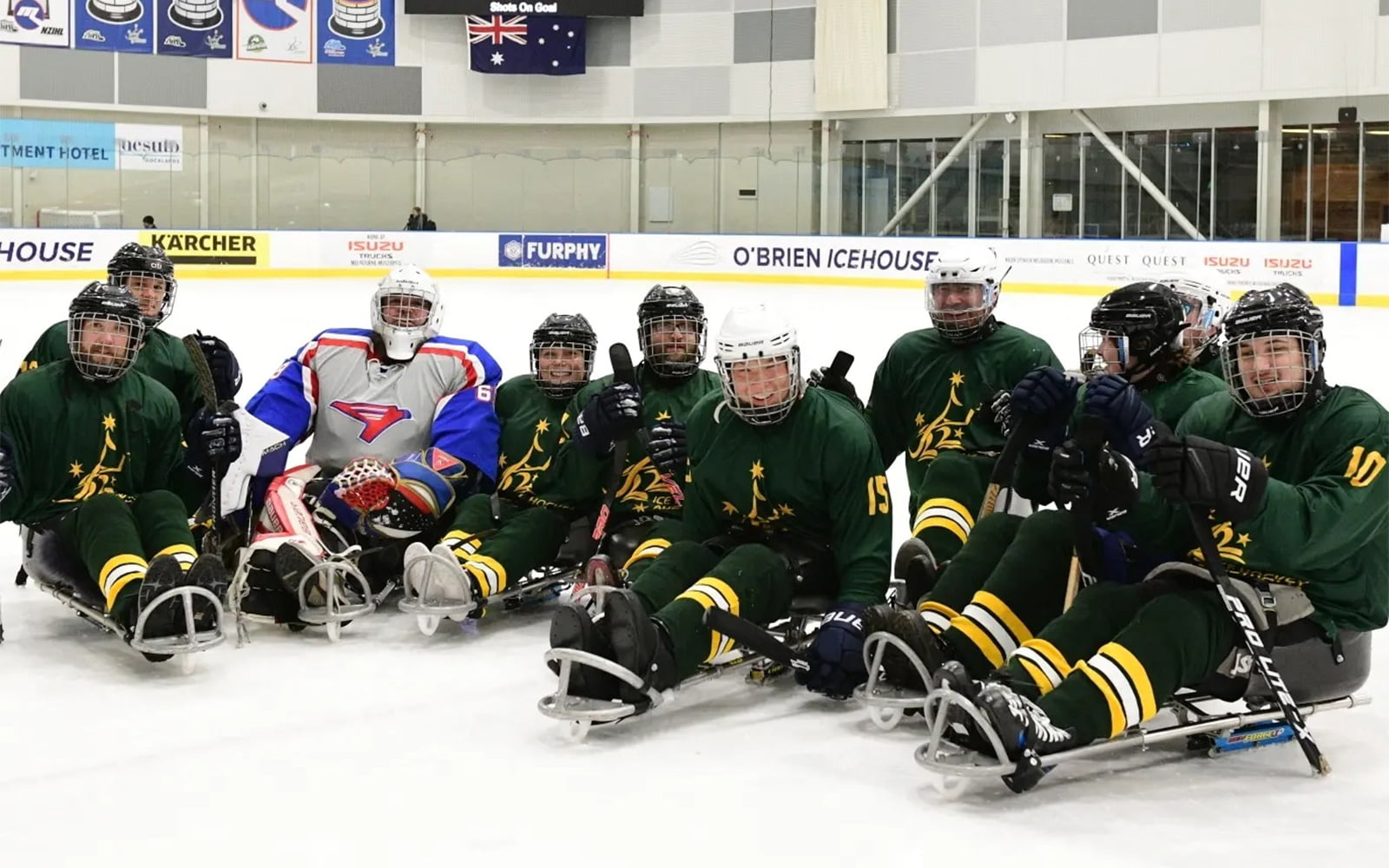 A group of Para-ice hockey players on the ice