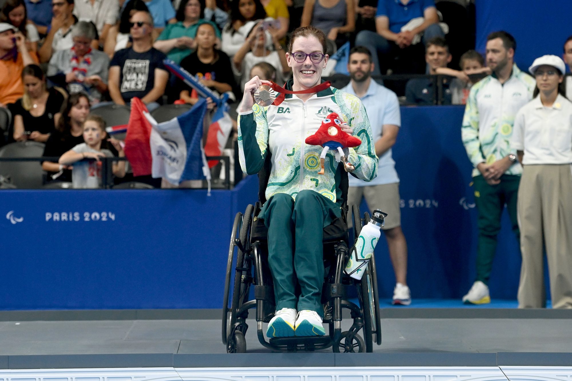 Rachael Watson at the medal ceremony for the presentation of her bronze medal in the 50m freestyle S3